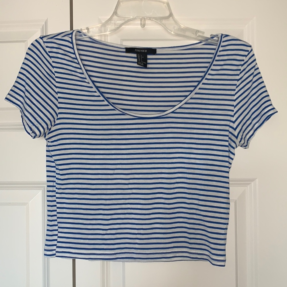 This is a blue and white striped crop top for summer and also a soft material.